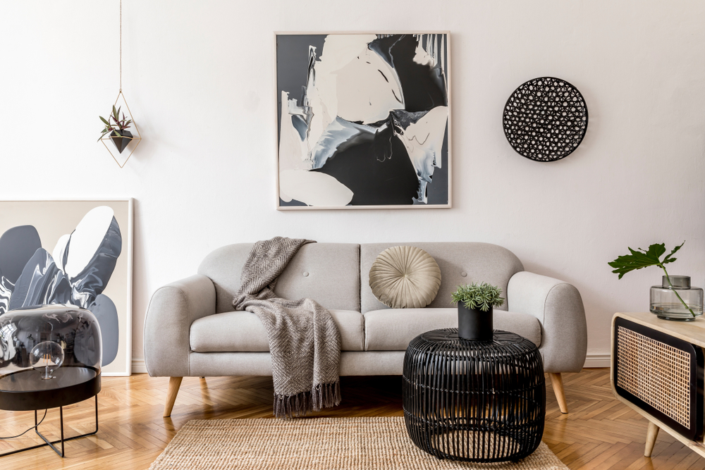 a living room with framed art | inexpensive ways to frame art