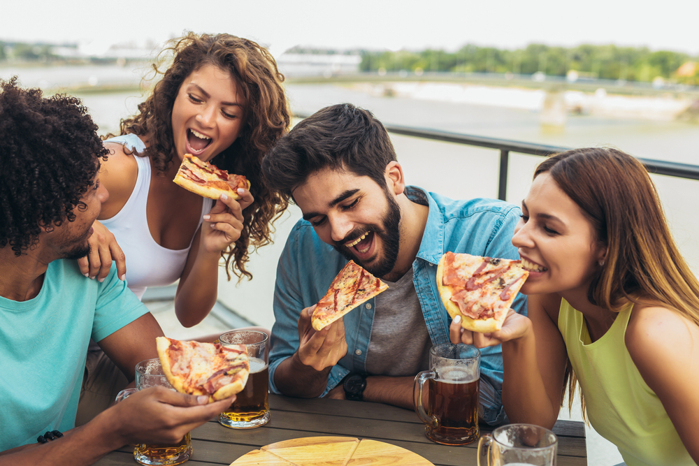 friends eating pizza | meals to make as a group