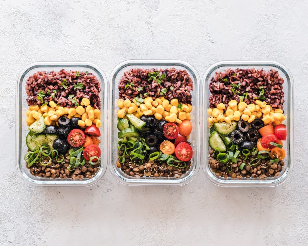three meal prepped dishes