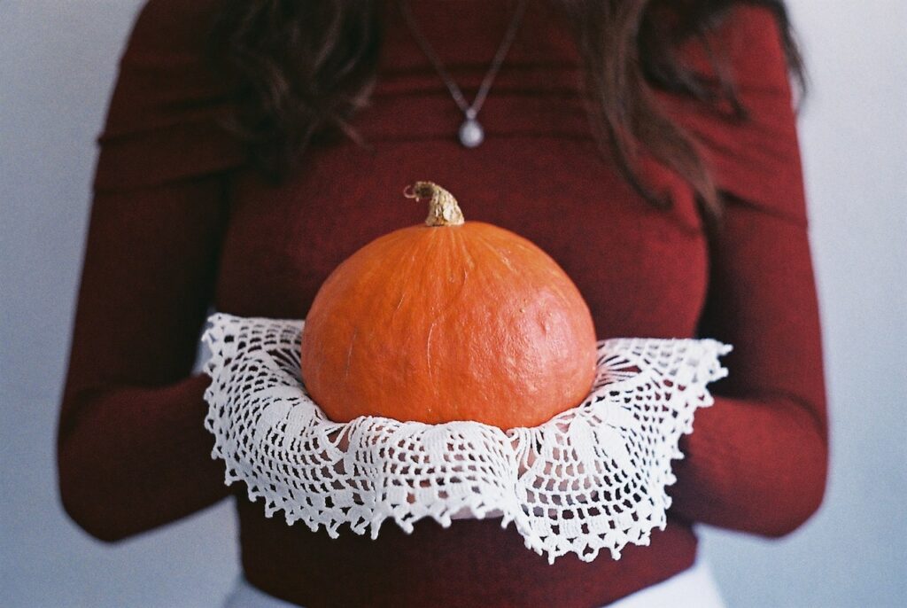 holding a pumpkin | DIY projects for fall